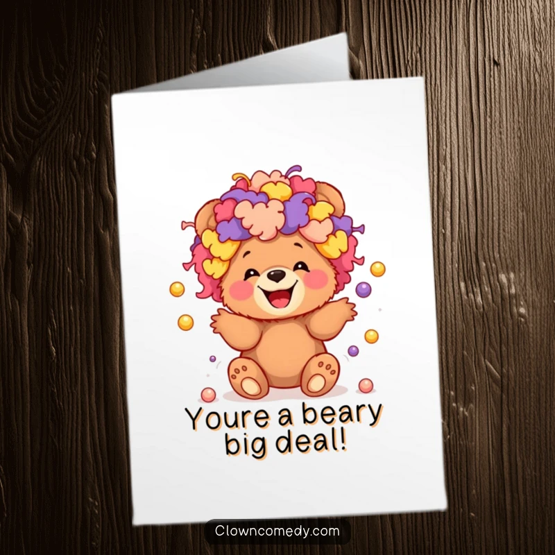 Funny Free Printable Congratulations Card: Giggling bear cub in an oversized clown wig juggling tiny balls, a spectacular gift.